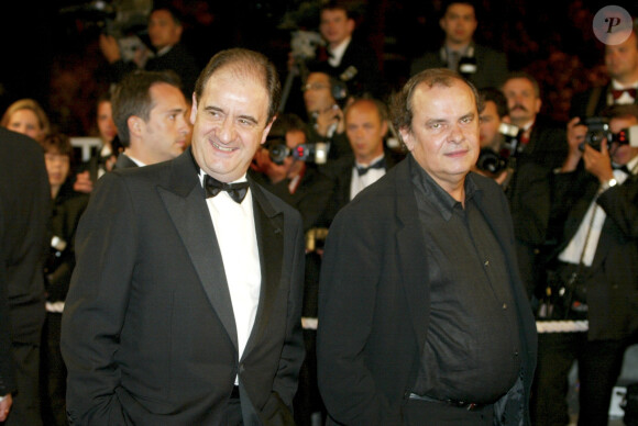 En France, à Cannes lors de la montée des marches du film Irreversible, lors du 55 ème Festival International du film de Cannes 2002, Pierre Lescure et Alain De Greef le 24 mai 2002.