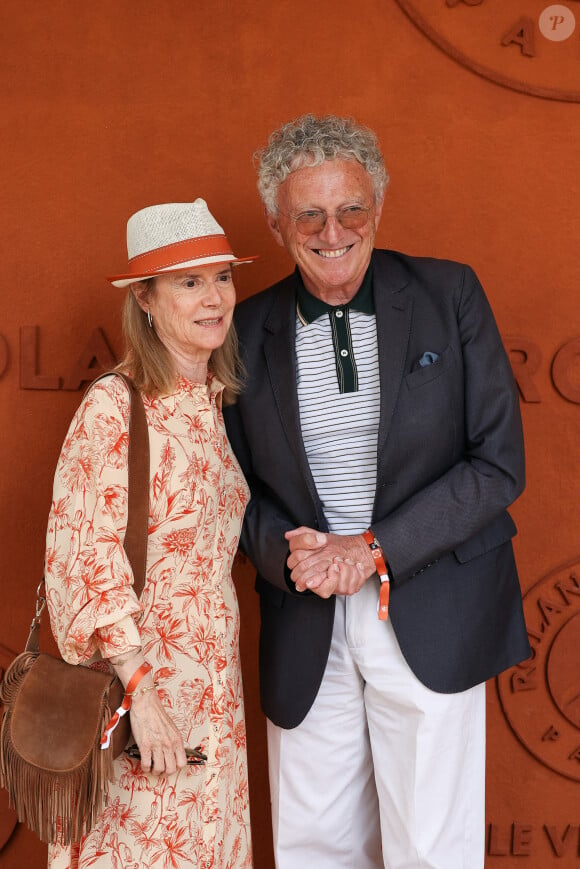 Nelson Monfort et sa femme au Village lors des Internationaux de France 2024 à Roland Garros le 8 juin 2024. Nasser Berzane/ABACAPRESS.COM