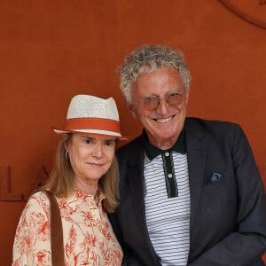 Nelson Monfort et sa femme au Village lors des Internationaux de France 2024 à Roland Garros le 8 juin 2024. Nasser Berzane/ABACAPRESS.COM