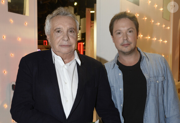 Michel Sardou et Davy Sardou - Enregistrement de l'émission " Vivement Dimanche " Spéciale Les enfants du Top 50, le 8 octobre 2014. L'émission sera diffusée le 12 Octobre 2014.