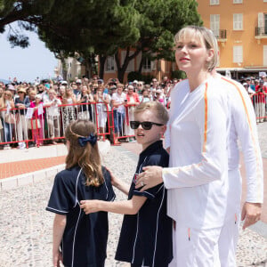 L'occasion alors de remarquer que la jeune fille a laissé pousser ses cheveux.
Princess Charlene of Monaco (La princesse Charlène de Monaco), Prince Albert II of Monaco (Le prince Albert II de Monaco), Prince Jacques of Monaco (Le prince Jacques de Monaco, marquis des Baux), Princess Gabriella of Monaco (La princesse Gabriella de Monaco, comtesse de Carladès) lors du relais de la Flamme Olympique des Jeux olympiques d'été de Paris 2024 à Monaco, le 18 juin 2024. Paris se prépare à accueillir les XXXIIIèmes Jeux Olympiques d'été, du 26 juillet au 11 août 2024. Olivier Huitel/Pool Monaco/Bestimage 