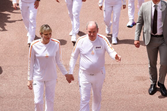 La princesse Charlène et le prince Albert II de Monaco lors du relais de la Flamme Olympique des Jeux olympiques d'été de Paris 2024 à Monaco, le 18 juin 2024. Paris se prépare à accueillir les XXXIIIèmes Jeux Olympiques d'été, du 26 juillet au 11 août 2024. Jean-Charles Vinaj/Pool Monaco/Bestimage 