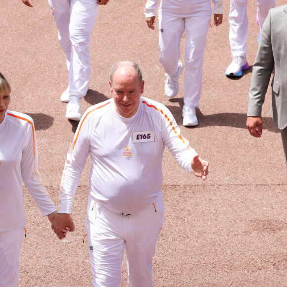 La princesse Charlène et le prince Albert II de Monaco lors du relais de la Flamme Olympique des Jeux olympiques d'été de Paris 2024 à Monaco, le 18 juin 2024. Paris se prépare à accueillir les XXXIIIèmes Jeux Olympiques d'été, du 26 juillet au 11 août 2024. Jean-Charles Vinaj/Pool Monaco/Bestimage 