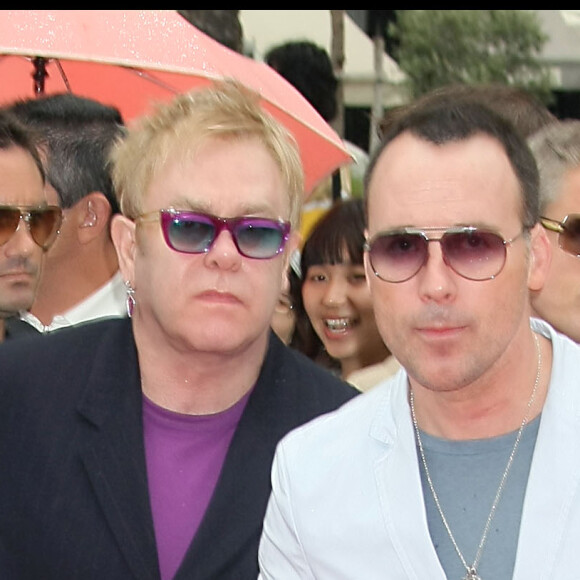 Visiblement, Elton John avait une envie très, très pressante !
Exclusif - Elton John et David Furnish.