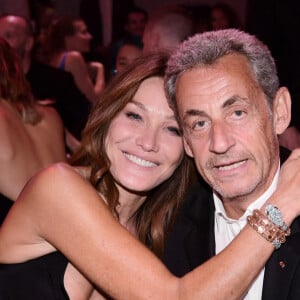 Carla Bruni-Sarkozy et son mari Nicolas Sarkozy - 19ème "Diner de la Mode" au bénéfice de Sidaction au Pavillon Cambon Capucines dans le cadre de la Fashion Week de Paris, France. Le 7 juillet 2022. © Rachid Bellak / Bestimage