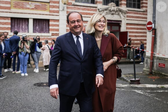 L'ancien président français François Hollande et son épouse Julie Gayet quittent un bureau de vote au premier tour des élections législatives à Tulle, le 30 juin 2024. Thibaud Moritz/ABACAPRESS.COM