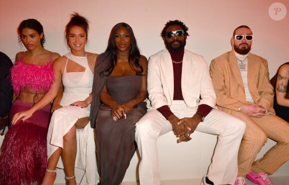 Tina Kunakey, Adèle Exarchopoulos, Aya Nakamura, Damso et SCH - Photocall en front row du défilé "Le Raphia" de la maison Jacquemus au Bourget le 12 décembre 2022