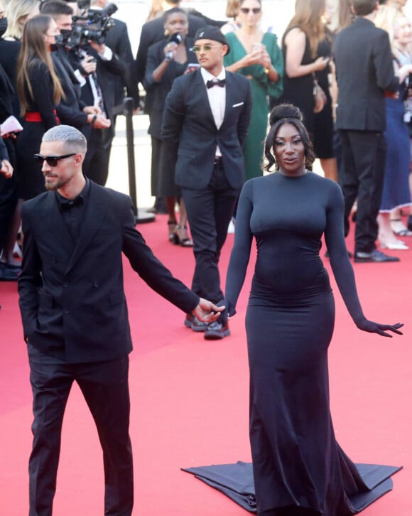 Vladimir Boudnikoff et sa compagne Aya Nakamura pendant la montée des marches du film " Armageddon Time " lors du 75ème Festival International du Film de Cannes, le 19 mai 2022