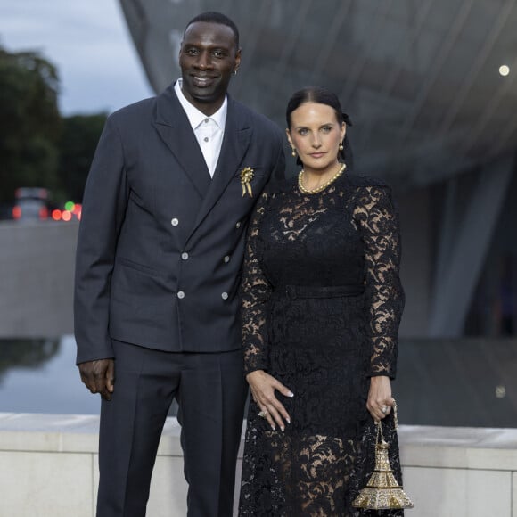 Il possède une maison secondaire avec sa femme Hélène
Omar Sy et sa Helene (bijoux Tasaki) - Photocall du dîner "Prelude pour les JO" à la Fondation Vuitton à Paris, France, le 25 juillet 2024. © Olivier Borde/Bestimage