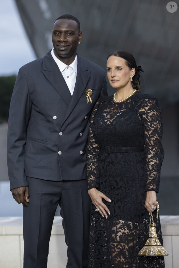 Omar Sy et sa Helene (bijoux Tasaki) - Photocall du dîner "Prelude pour les JO" à la Fondation Vuitton à Paris, France, le 25 juillet 2024. © Olivier Borde/Bestimage 