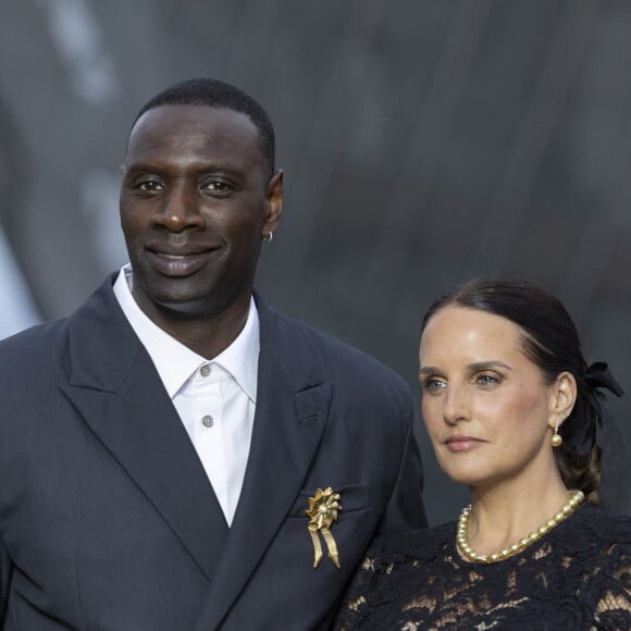 Omar Sy et sa Helene (bijoux Tasaki) - Photocall du dîner "Prelude pour les JO" à la Fondation Vuitton à Paris, France, le 25 juillet 2024. © Olivier Borde/Bestimage 