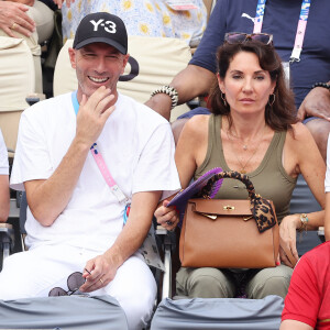 Un couple qui a attiré tous les regards à Roland-Garros...
Zinedine Zidane avec sa femme Véronique assistent à la victoire de Rafael Nadal et Carlos Alcaraz face à T. Griekspoor et W. Koolhof lors des Jeux Olympiques de Paris2024 (JO) © Jacovides-Perusseau/Bestimage 