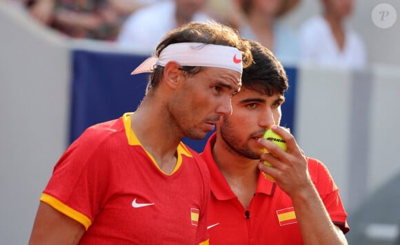 Le tandem espagnol a réussi les battre au super tie-break (6-4 6-7 10-2). Ce dernier affrontera ce mercredi les Américains Austin Krajicek et Rajeev Ram.
Rafael Nadal et Carlos Alcaraz Rafael Nadal et Carlos Alcaraz battent T. Griekspoor et W. Koolhof dans le tournoi olympique de tennis lors des Jeux Olympiques de Paris2024 (JO) à Paris le 30 Juillet 2024 © Jacovides - Perusseau / Bestimage