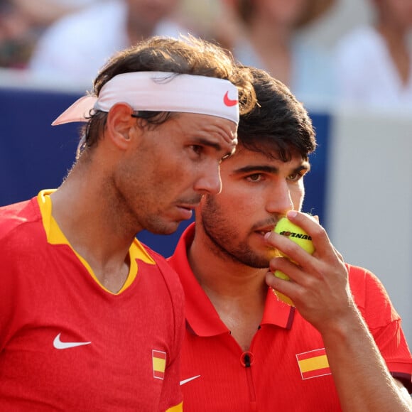 Le tandem espagnol a réussi les battre au super tie-break (6-4 6-7 10-2). Ce dernier affrontera ce mercredi les Américains Austin Krajicek et Rajeev Ram.
Rafael Nadal et Carlos Alcaraz Rafael Nadal et Carlos Alcaraz battent T. Griekspoor et W. Koolhof dans le tournoi olympique de tennis lors des Jeux Olympiques de Paris2024 (JO) à Paris le 30 Juillet 2024 © Jacovides - Perusseau / Bestimage