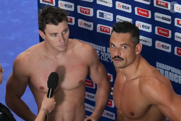 Le nageur de 25 ans est de retour ce jeudi 1er août lors de l'épreuve du 50 m nage libre, aux côtés de Florent Manaudou. 
Maxime Grousset et Florent Manaudou - F.Manaudou remporte l'épreuve du 50 m nage libre, sous le regard de sa compagne L.Dumenil, aux championnats de France de Natation 2024 au centre aquatique Odyssée à Chartres, le 20 juin 2024. © Laurent Lairys / Panoramic / Bestimage