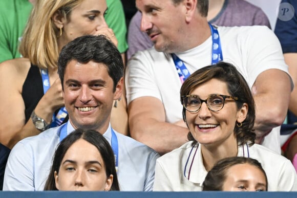 Gabriel Attal et Amélie Oudéa-Castéra - Les célébrités assistent à la victoire du français Félix Lebrun en quart de finale des épreuves de tennis de table lors des Jeux Olympiques de Paris 2024 (JO) à l'Arena Paris Sud, à Paris, France, le 1er août 2024. © Jacovides-Perusseau/Bestimage 