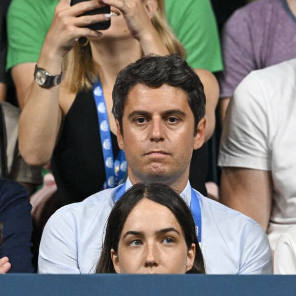 Le Premier ministre en avait bien besoin
Gilles Erb, Gabriel Attal et Amélie Oudéa-Castéra - Les célébrités assistent à la victoire du français Félix Lebrun en quart de finale des épreuves de tennis de table lors des Jeux Olympiques de Paris 2024 (JO) à l'Arena Paris Sud, à Paris, France, le 1er août 2024. © Jacovides-Perusseau/Bestimage 