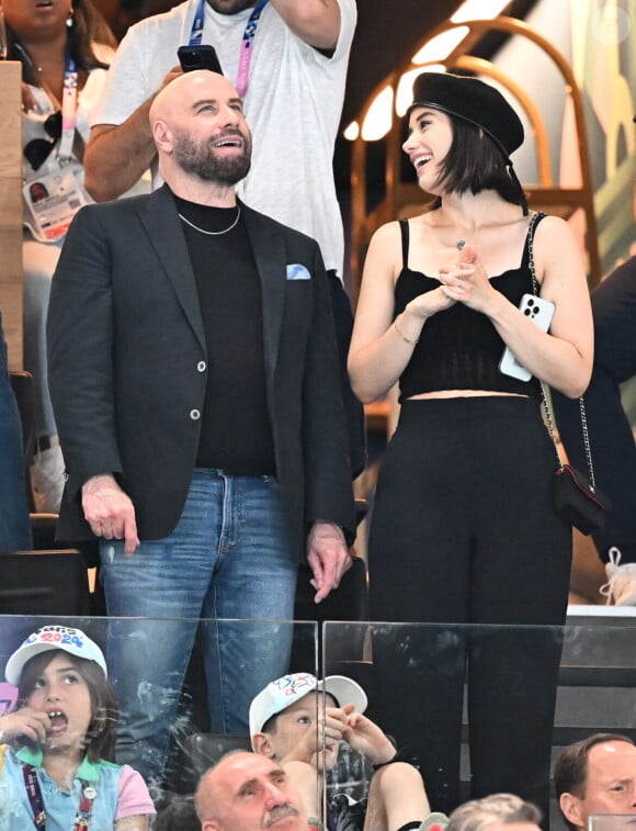 John Travolta et sa fille Ella Bleu assistent aux épreuves de gymnastique lors des Jeux Olympiques de Paris2024 (JO) le 3 aout 2024. © Perusseau-Jacovides-Bestimage 