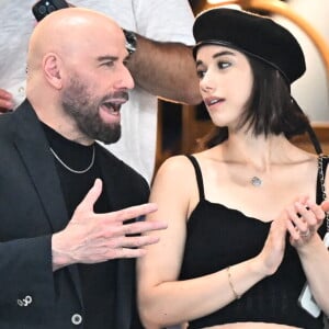 John Travolta et sa fille Ella Bleu assistent aux épreuves de gymnastique lors des Jeux Olympiques de Paris2024 (JO) le 3 aout 2024. © Perusseau-Jacovides-Bestimage 