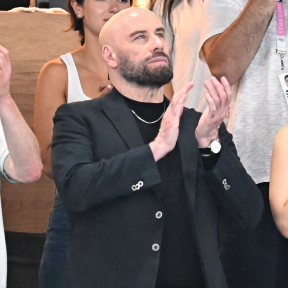 John Travolta et sa fille Ella Bleu assistent aux épreuves de gymnastique lors des Jeux Olympiques de Paris2024 (JO) le 3 aout 2024. © Perusseau-Jacovides-Bestimage 