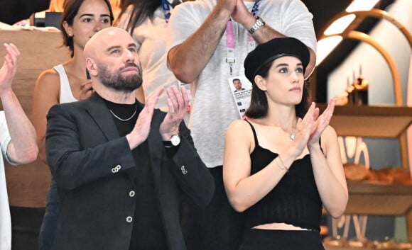 John Travolta et sa fille Ella Bleu assistent aux épreuves de gymnastique lors des Jeux Olympiques de Paris2024 (JO) le 3 aout 2024. © Perusseau-Jacovides-Bestimage 