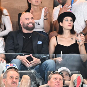 Les Jeux Olympiques de Paris continuent de déchaîner les passions à l'international. 
John Travolta et sa fille Ella Bleu assistent aux épreuves de gymnastique lors des Jeux Olympiques de Paris2024 (JO) © Perusseau-Jacovides-Bestimage 