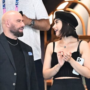 John Travolta et sa fille Ella Bleu assistent aux épreuves de gymnastique lors des Jeux Olympiques de Paris2024 (JO) le 3 aout 2024. © Perusseau-Jacovides-Bestimage 