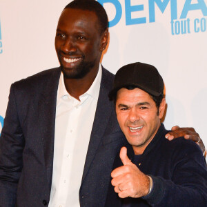 Tout comme son ami Jamel Debbouze qui a grandi comme lui à Trappes
Omar Sy, Jamel Debbouze - Avant première du film "Demain tout commence" au Grand Rex à Paris. © Coadic Guirec/Bestimage