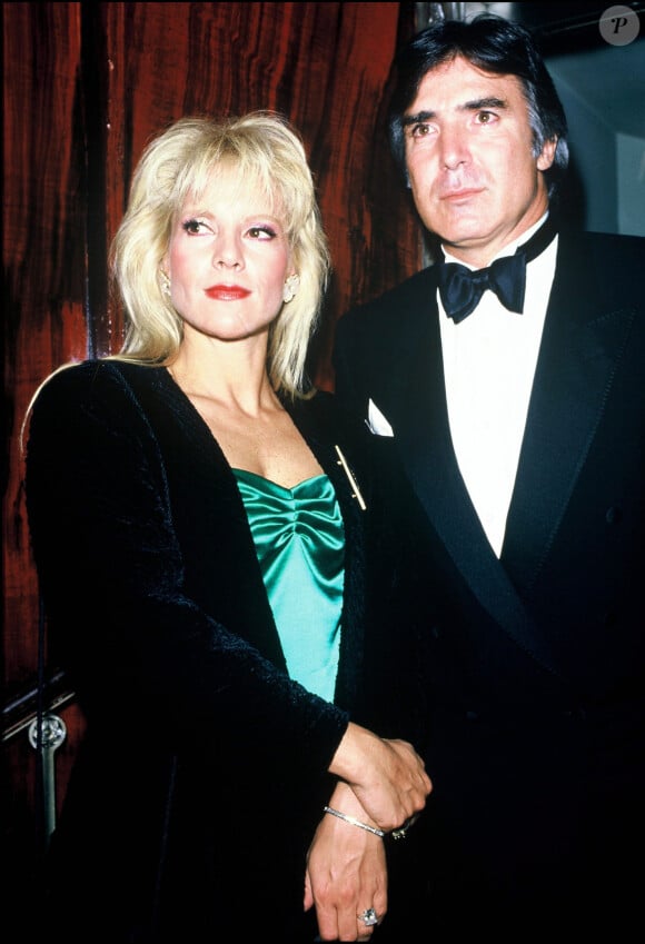 Sylvie Vartan et Tony Scotti lors d'une soirée chez Maxim's