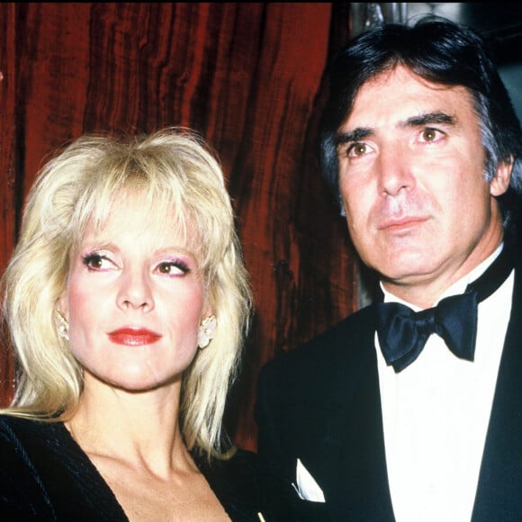 Sylvie Vartan et Tony Scotti lors d'une soirée chez Maxim's