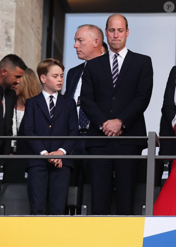 Le prince William avec son fils, le prince George de Galles, et le roi Felipe VI d'Espagne dans les tribunes lors de la finale de l'Euro 2024 à l'Olympiastadion à Berlin, le 14 juillet 2024.