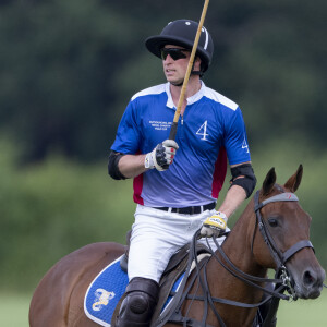 Le prince William de Galles lors du match caritatif de polo "Royal Charity Polo Cup" au Guards Polo Club à Windsor, le 12 juillet 2024