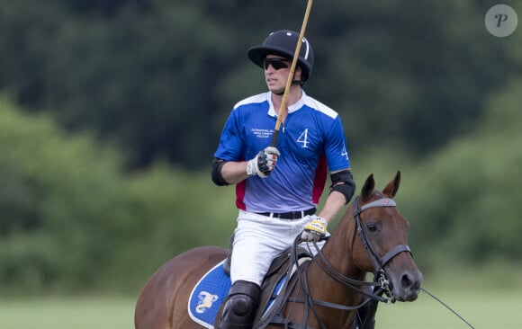 Le prince William de Galles lors du match caritatif de polo "Royal Charity Polo Cup" au Guards Polo Club à Windsor, le 12 juillet 2024