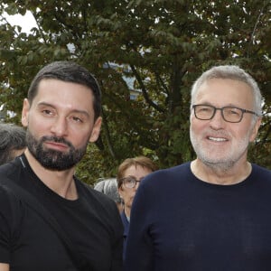 Ce jeudi 15 août, M6 lance la nouvelle et troisième saison des "Traîtres". 
Exclusif - Hugo Manos et son compagnon Laurent Ruquier I - Inauguration de la place Line Renaud a Rueil-Malmaison. © Jlppa / Bestimage