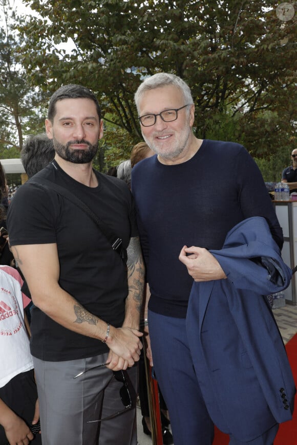 Une suprise étant donné que le couple se veut discret depuis le début de leur relation.
Exclusif - Hugo Manos et son compagnon Laurent Ruquier I - Inauguration de la place Line Renaud a Rueil-Malmaison le 22 Juin 2024. © Jlppa / Bestimage