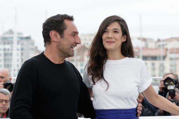 Evoquant un passé parfois compliqué, synonyme de violence, il a raconté comment il n'avait pas suivi ce modèle.
Gilles Lellouche, Mélanie Doutey lors du photocall du film "Le grand bain" au 71ème Festival International du Film de Cannes, le 13 mai 2018. © Borde / Jacovides / Moreau / Bestimage 