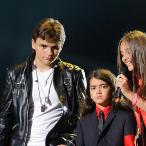 Mais on vient d'apprendre que les enfants venaient de gagner une grande bataille.Les enfants de Michael Jackson, (de gauche à droite Prince Michael, Blanket et Paris) sur scène lors du concert Michael Forever Tribute au Millennium Stadium, Cardiff, Royaume-Uni, samedi 8 octobre 2011. Photo par Matt Crossick/EMPICS Entertainment/ABACAPRESS.COM