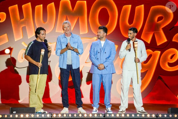 Le comédien lance la première édition du festival "L'Humour à la plage".
Exclusif - Samuel Bambi, Denis Brogniart, Kev Adams, Ilyes Djadel - Jour 2 - Enregistrement de l'émission "L'humour à la plage" pour le 1er festival de Juan les Pins à la pinède Gould le 5 juillet 2024. © JR Santini / Bruno Bebert / Bestimage