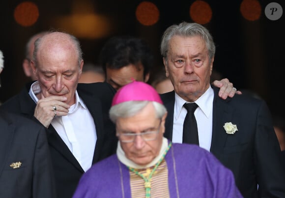 Monseigneur Di Falco, Pascal Desprez et Alain Delon - Sorties des obsèques de Mireille Darc en l'église Saint-Sulpice à Paris. Le 1er septembre 2017