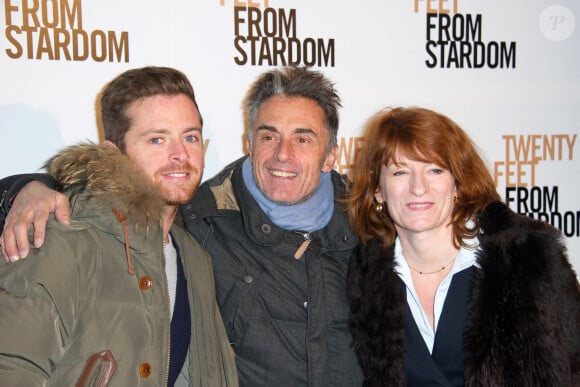 Les deux hommes étaient très amis puisque Patrice Laffont était le parrain d'Antoine, le fils de Gérard...Gérard Holtz avec son fils Antoine et sa femme Muriel Hotz Mayette assistant à la première de Twenty Feet From Stardom à l'Ugc Normandie, à Paris, France, le 18 novembre 2013. Photo par Laurent Zabulon/ABACAPRESS.COM