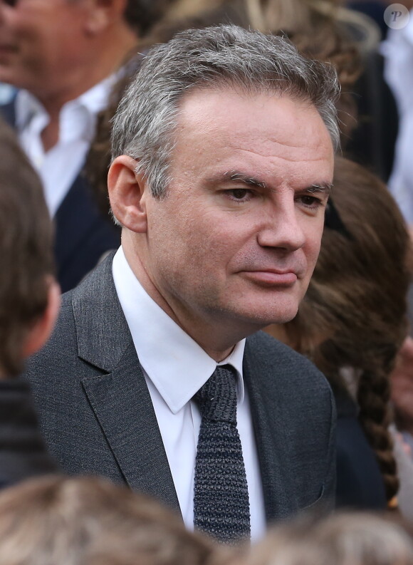 Eric Brunet - Sorties des obsèques de Patrice Dominguez en la basilique Sainte Clotilde à Paris. Le 16 avril 2015