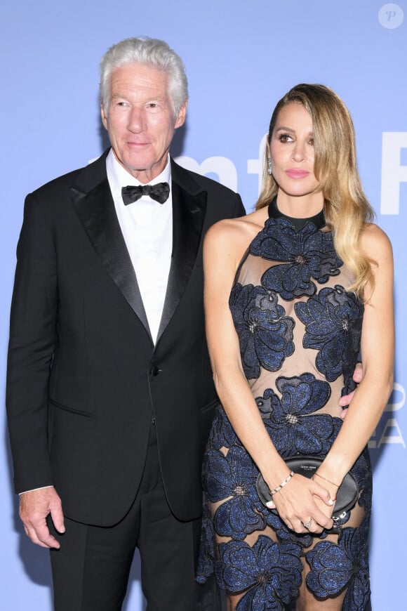 Richard Gere, Alejandra Silva au photocall du gala de l'amfAR lors du 81ème festival international du film de Venise, la Mostra le 1er septembre 2024.