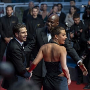 Jean-Pascal Zadi, François Civil, Adèle Exarchopoulos - Descente des marches du film " L'amour ouf " lors du 77ème Festival International du Film de Cannes, au Palais des Festivals à Cannes. Le 23 mai 2024 © Olivier Borde / Bestimage 