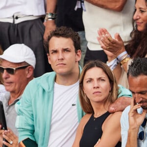 Théo Curin et sa compagne Marie-Camille Fabas - Célébrités en tribunes des Internationaux de France de tennis de Roland Garros 2023 à Paris le 11 juin 2023. © Jacovides-Moreau/Bestimage 