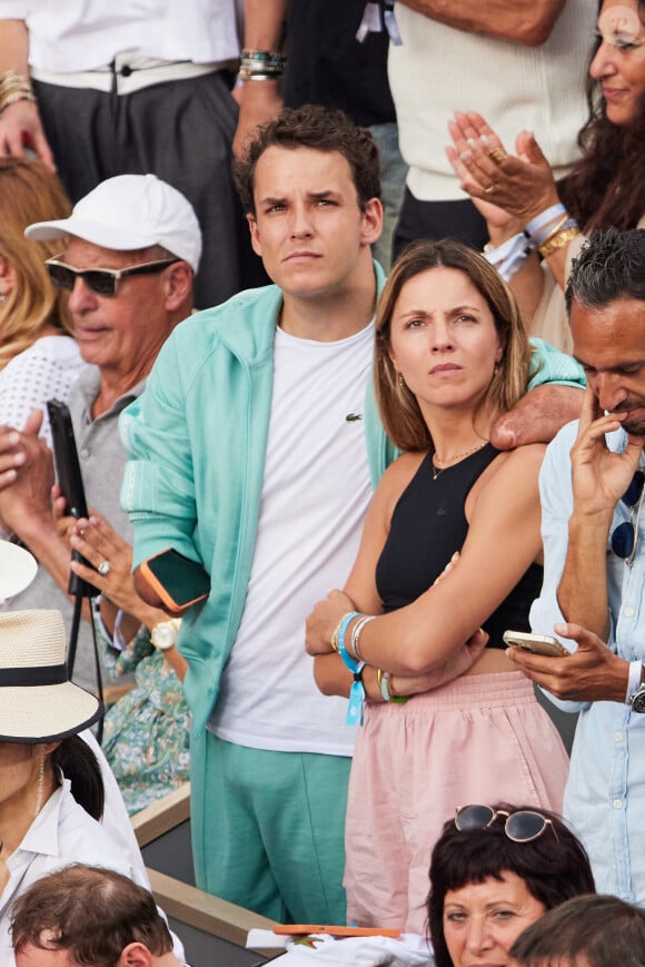 Théo Curin et sa compagne Marie-Camille Fabas - Célébrités en tribunes des Internationaux de France de tennis de Roland Garros 2023 à Paris le 11 juin 2023. © Jacovides-Moreau/Bestimage 