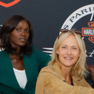 Emilie Gomis et Alexandra Vandernoot - Soirée de présentation des nouveautés de la marque Harley Davidson au showroom Beaumarchais à Paris, le 22 septembre 2022. © Christophe Clovis/Bestimage