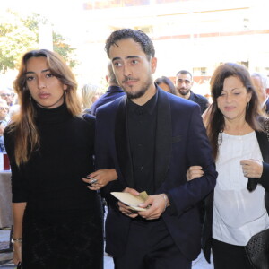 Les obsèques de Didier Roustan se sont déroulées à Cannes
Murielle Roustan, son ex-compagne avec leurs enfants Charlotte et Dimitri - Obsèques du journaliste sportif, Didier Roustan en l'église Notre-Dame-des-Pins, à Cannes © Franz Chavaroche/Bestimage