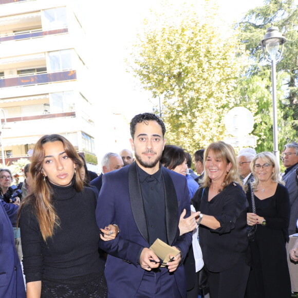 Ses enfants Charlotte et Dimitri - Obsèques du journaliste sportif, Didier Roustan, décédé le 11 septembre à l'âge de 66 ans en l'église Notre-Dame-des-Pins, à Cannes le 20 septembre 2024. © Franz Chavaroche/Bestimage