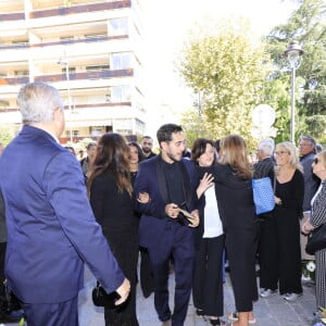 Murielle Roustan, son ex-femme avec leurs enfants Charlotte et Dimitri - Obsèques du journaliste sportif, Didier Roustan, décédé le 11 septembre à l'âge de 66 ans en l'église Notre-Dame-des-Pins, à Cannes le 20 septembre 2024. © Franz Chavaroche/Bestimage