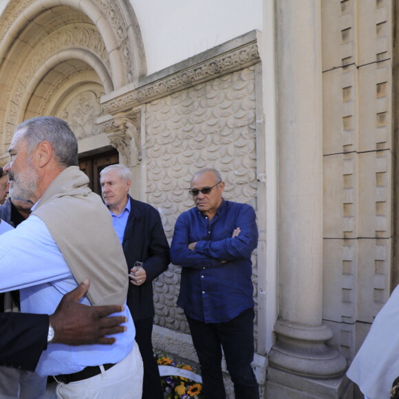 Basile Boli - Obsèques du journaliste sportif, Didier Roustan, décédé le 11 septembre à l'âge de 66 ans en l'église Notre-Dame-des-Pins, à Cannes le 20 septembre 2024. © Franz Chavaroche/Bestimage 